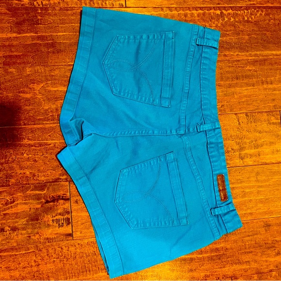 Calvin Klein turquoise denim shorts Women’s size 14 - Picture 1 of 7